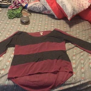 I am selling a grey and red long sleeved shirt